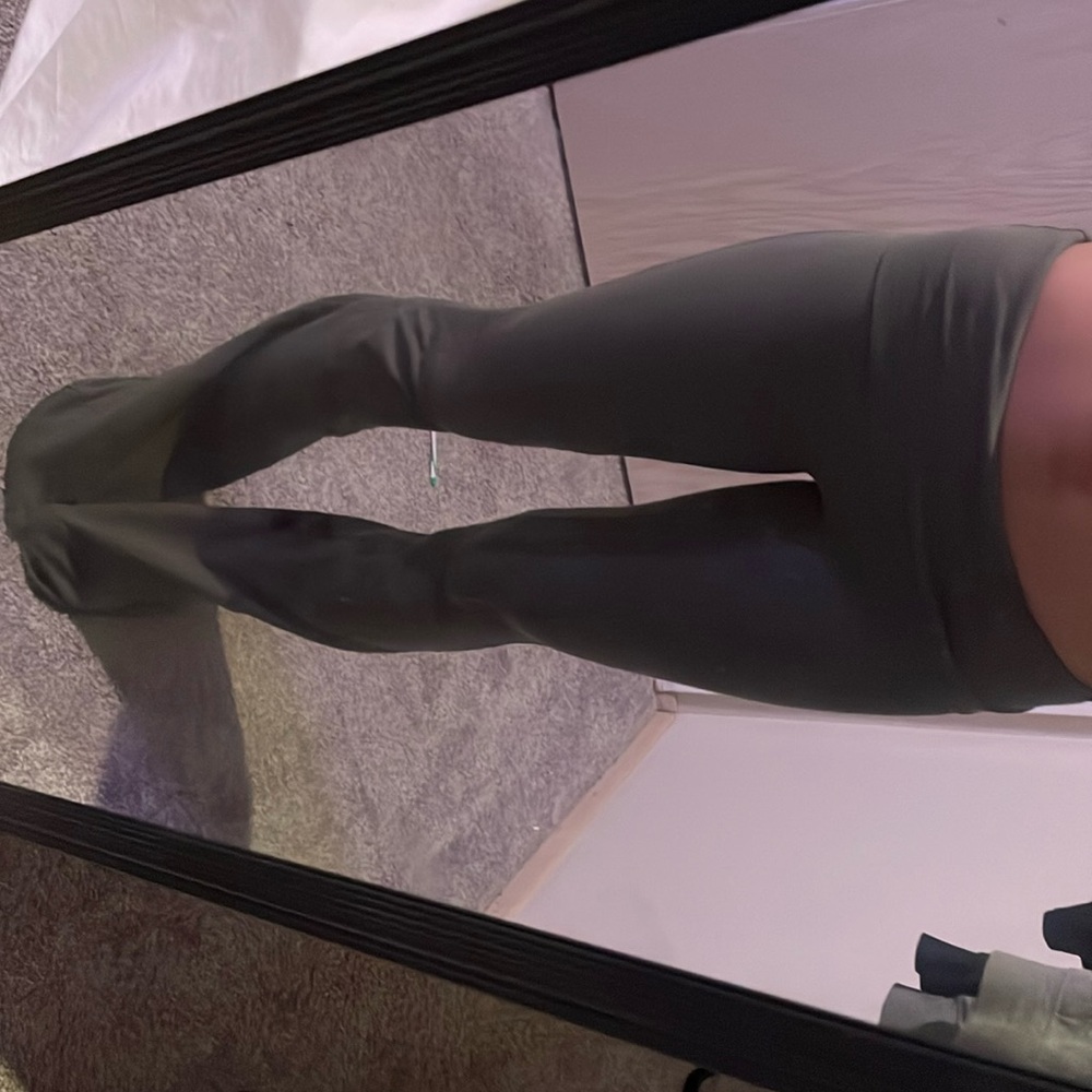 Green flared leggings